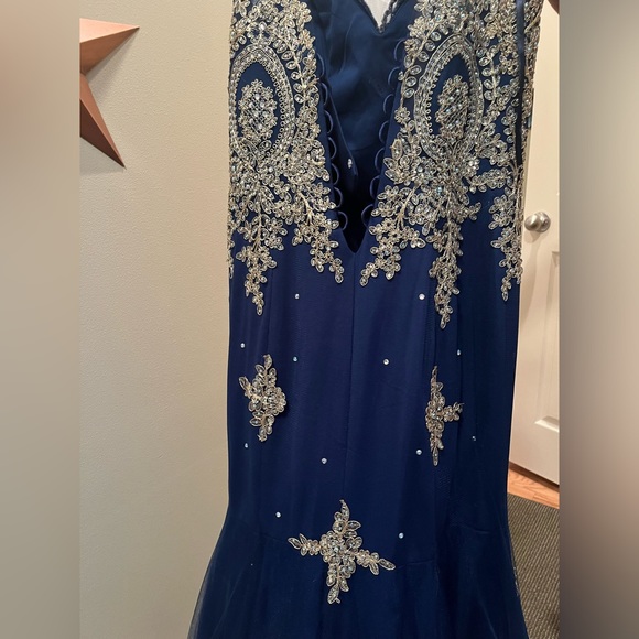 Blue mermaid style prom dress with gold detailing from Anny Lee. - Picture 2 of 5